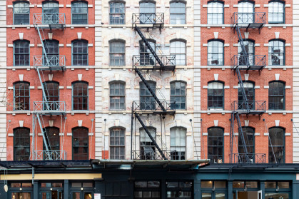 Exterior view of historic brick buildings along Duane Street in the Tribeca neighborhood of New York City NYC