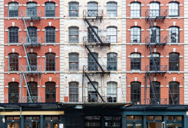 Exterior view of historic brick buildings along Duane Street in the Tribeca neighborhood of New York City NYC